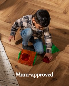 A child playing on LVT flooring